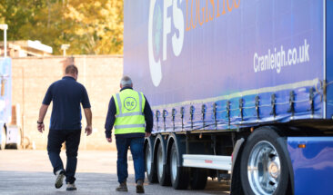 Driver checking truck