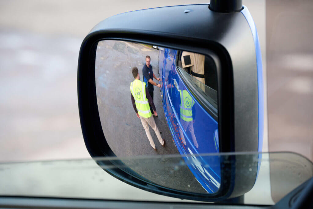 Driver checking truck