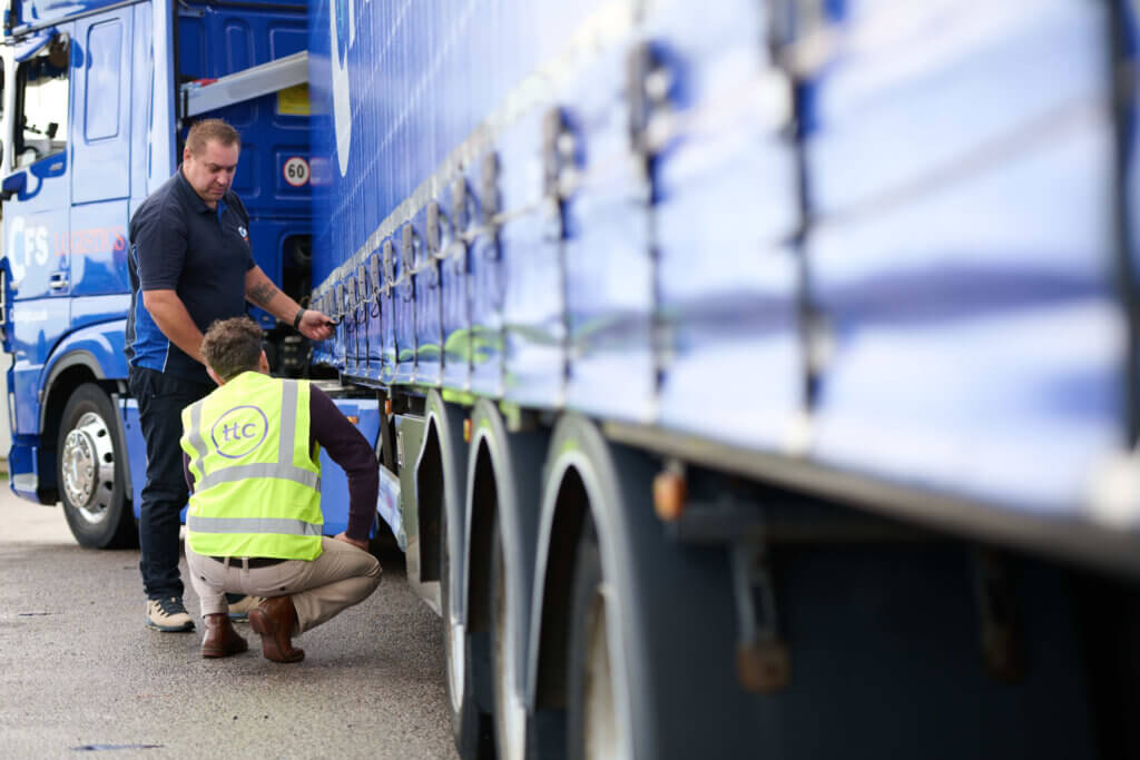 Driver checking truck