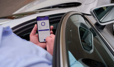 Driver checking phone app