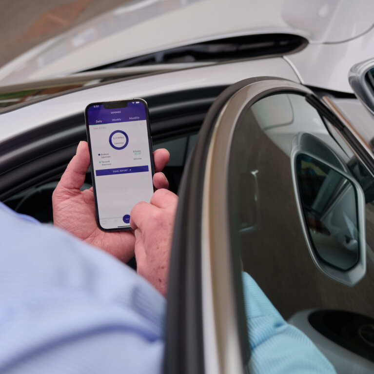 Driver checking phone app
