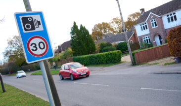 car going past 30 mph speed camera sign