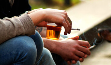 smoking and beer in hand