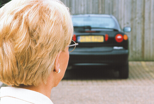 Lady in glasses - specsavers number plate test