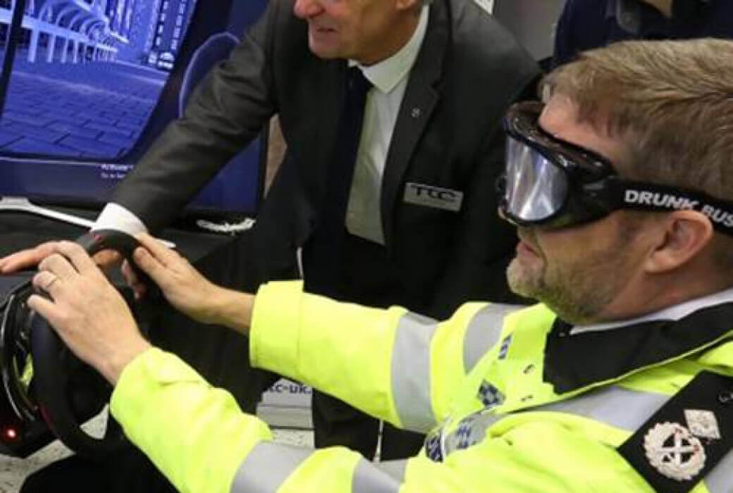 Deputy Chief Constable Chris Singer uses the simulator