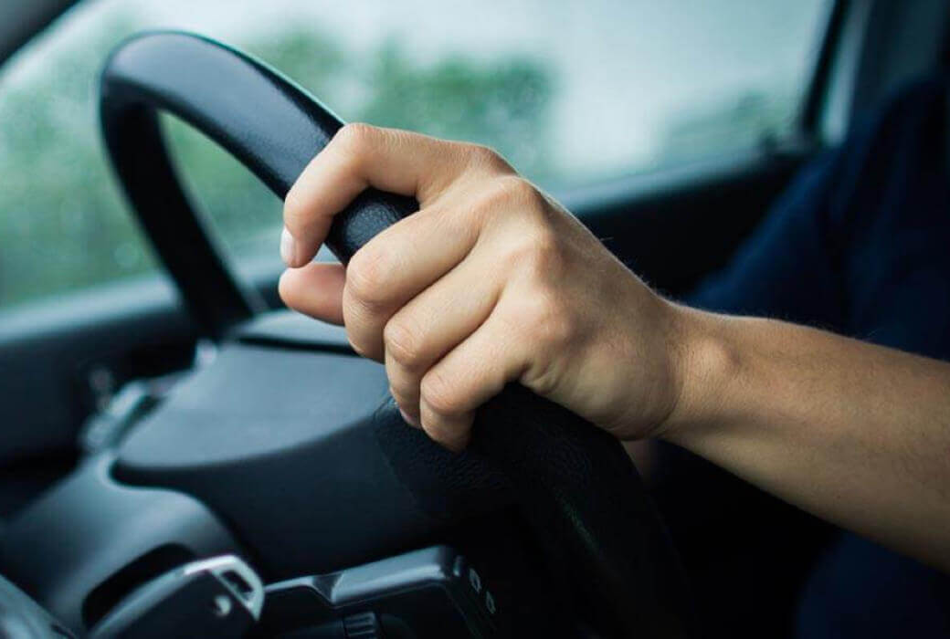 Driving man steering wheel