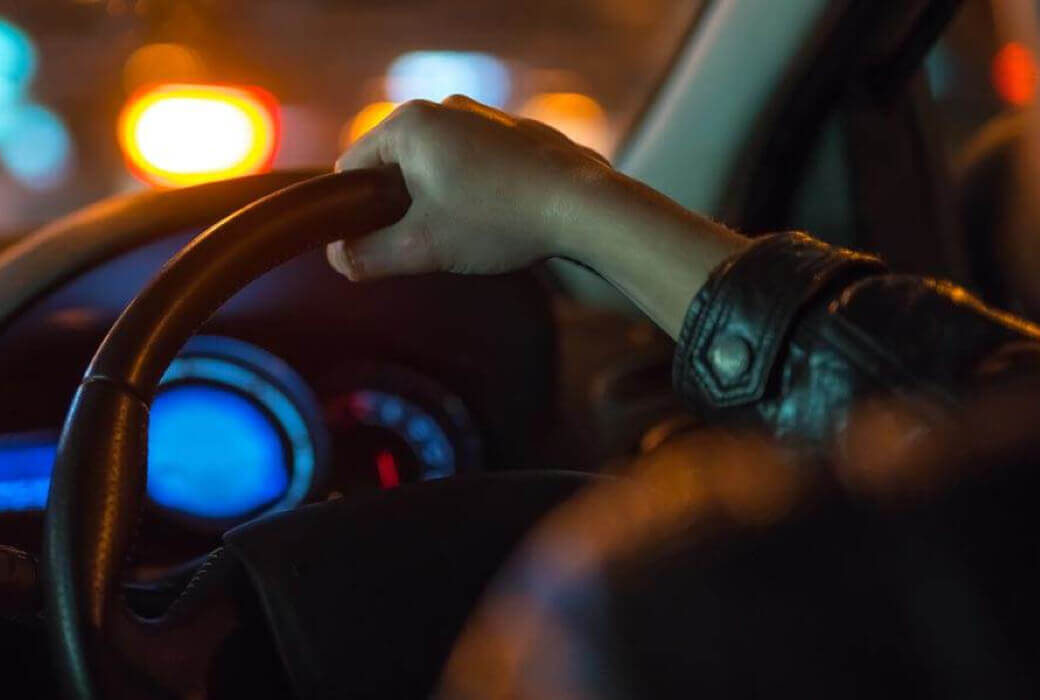 Man driving at night