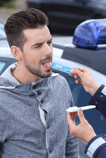 Police drug spot check day young man